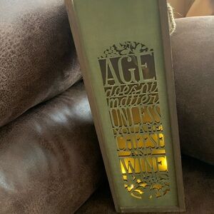 Lighted 
Age doesn’t matter unless you are cheese and wine decor